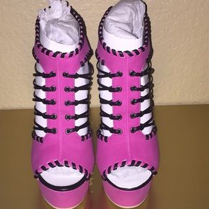 Stand out fuchsia pink and black platform bootie